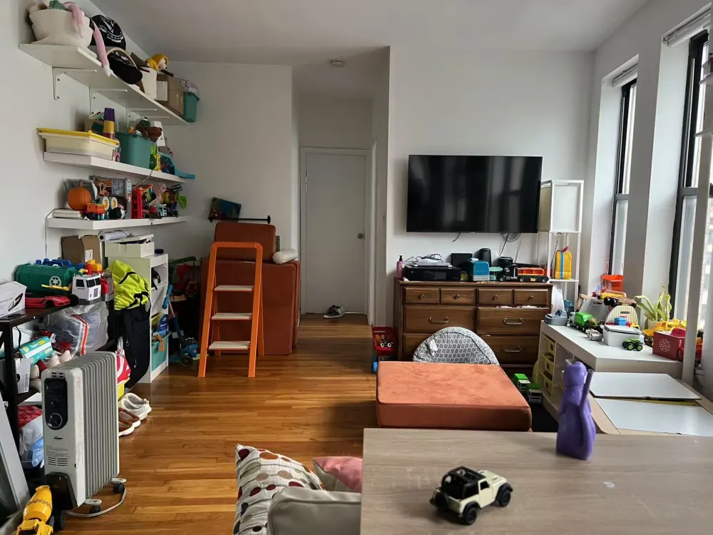 Toy-filled bright apartment living room