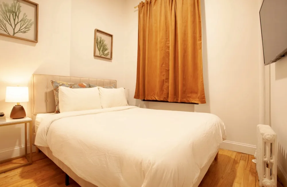 Cozy room with comfortable bed.