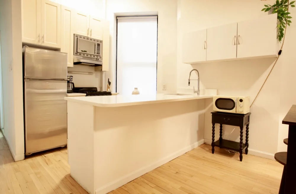 Bright, clean, modern kitchen space.