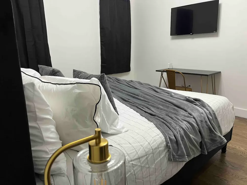 Modern minimalistic bedroom with desk