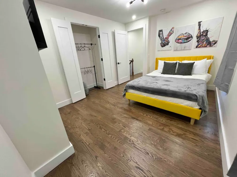 Modern bedroom with vibrant decor.