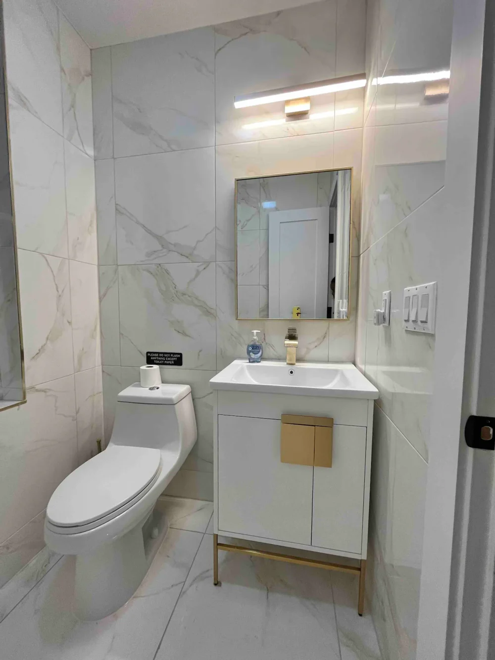 Modern bathroom with marble tiles.