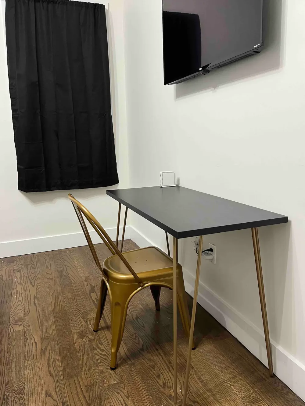 Minimalist desk and chair setup.