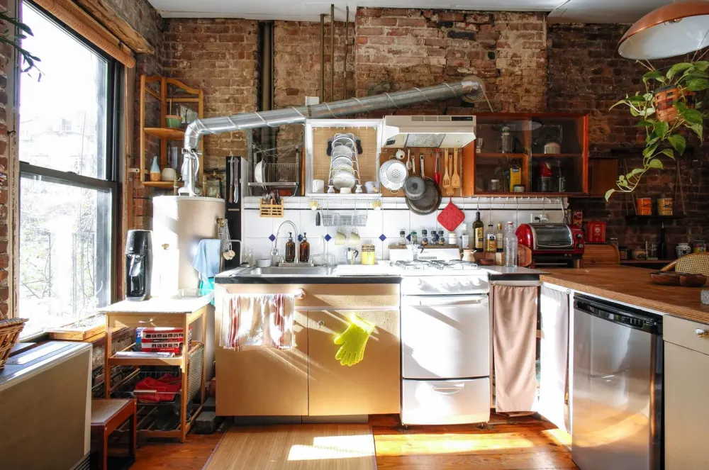 Cozy kitchen with rustic brickwork.