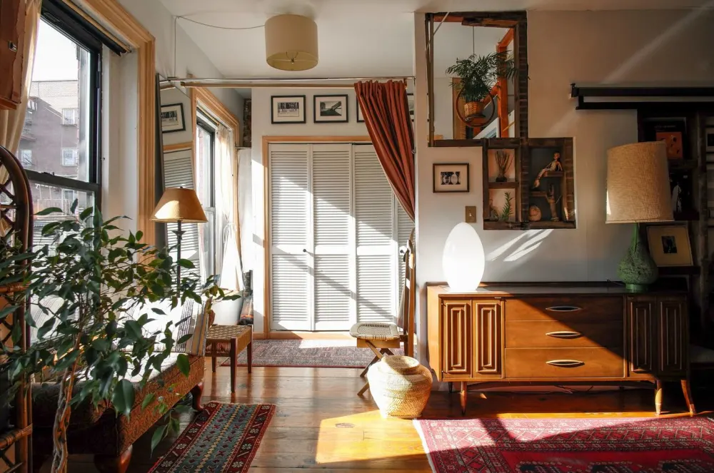 Cozy sunlight-filled eclectic living room.