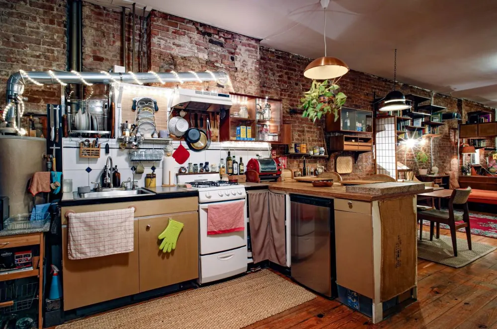 Cozy loft kitchen with plants.