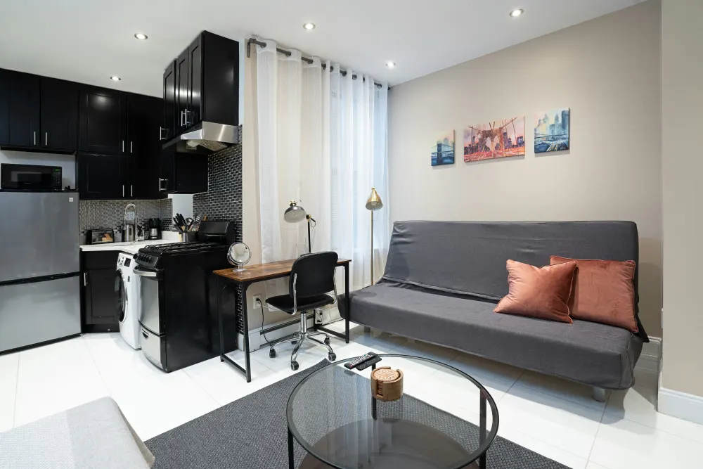 Compact modern studio with kitchenette