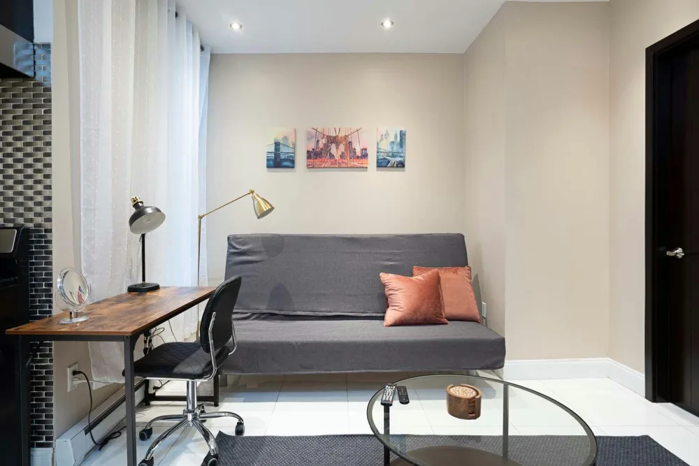 Modern living room with workspace.