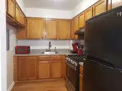 Cozy kitchen with oak cabinets