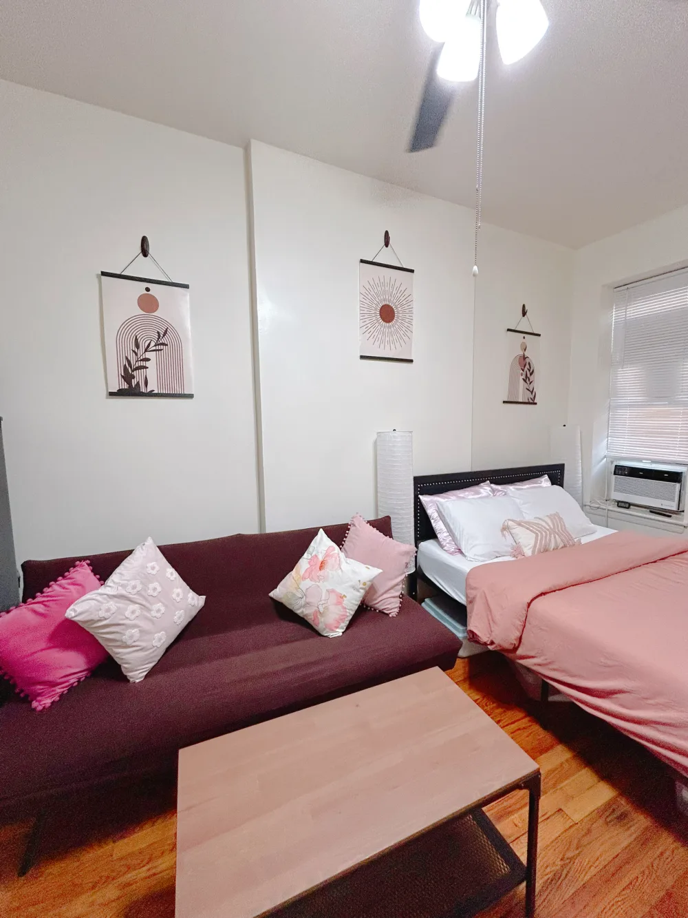 Plush sofa, wooden table, bed