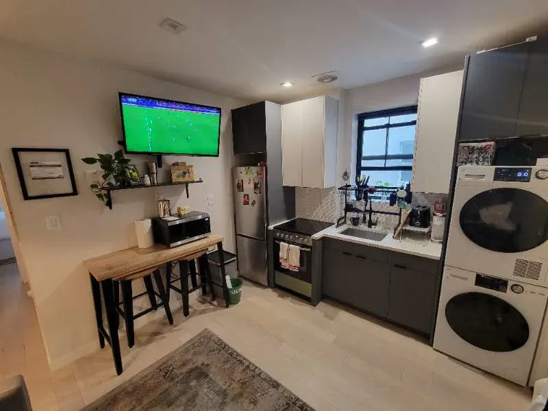 Compact modern kitchen with appliances