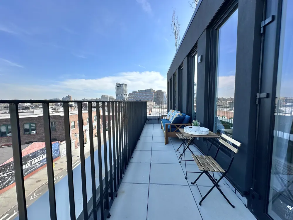 Modern balcony with city views.