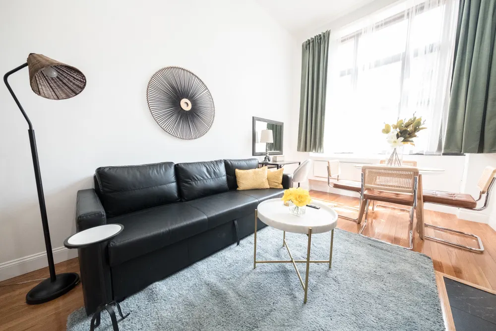 Cozy room with black sofa