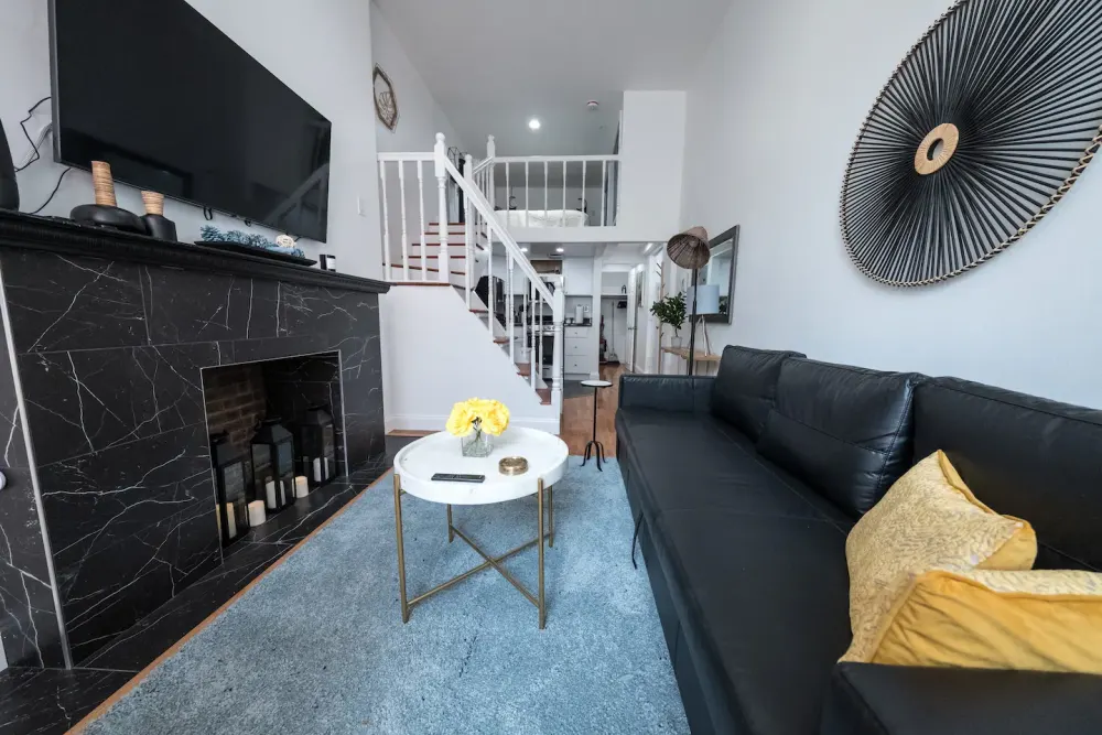Modern, stylish living room with loft.