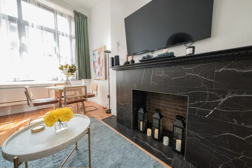 Modern living room with fireplace.