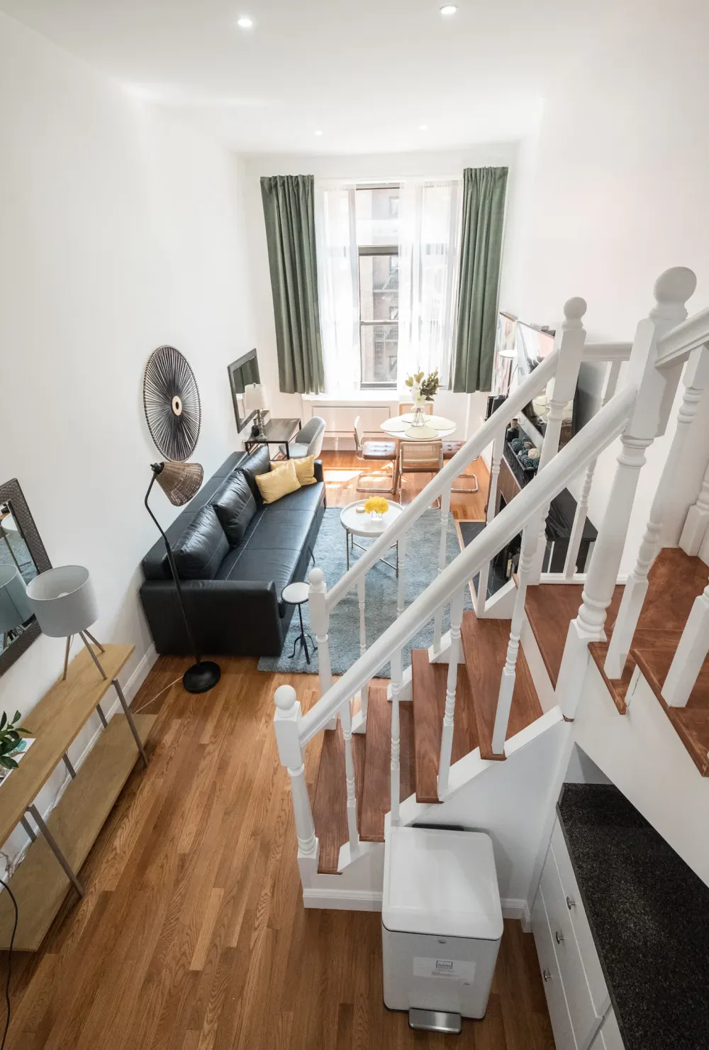 Modern loft-style living room space.