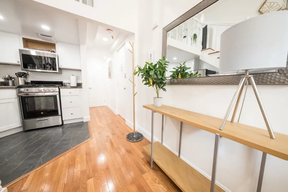 Modern kitchen with wooden floors.