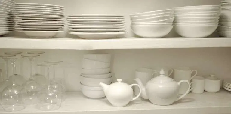 White dishes, bowls, cups, teapots