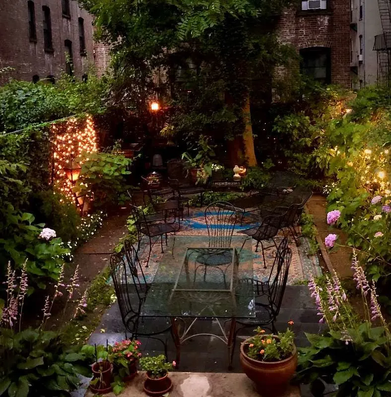 Cozy garden patio softly lit