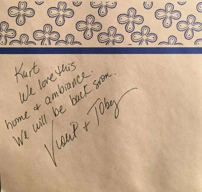 Handwritten note on patterned stationery