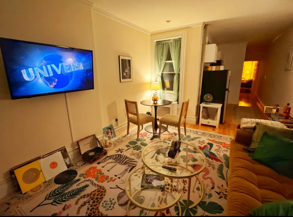 Cozy living room with television.
