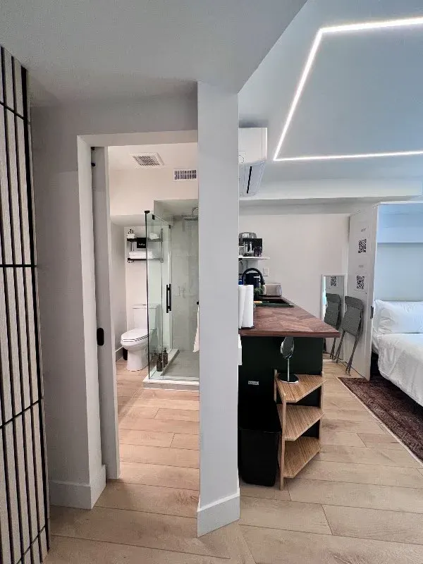 Bright modern studio with kitchenette