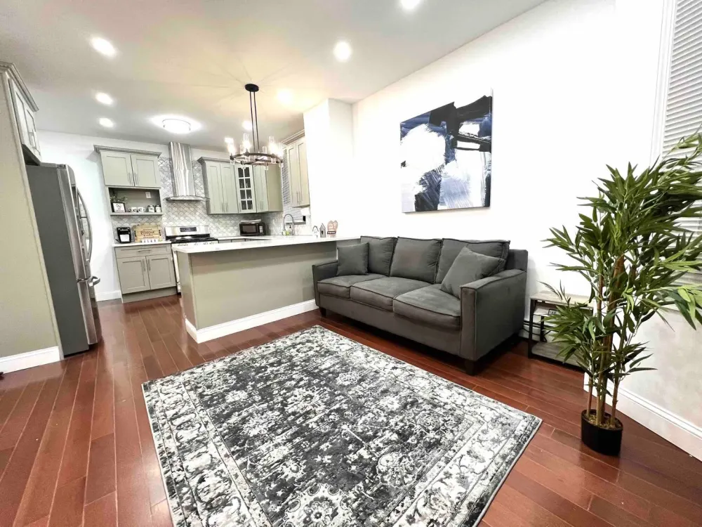 Modern apartment with kitchen and living.