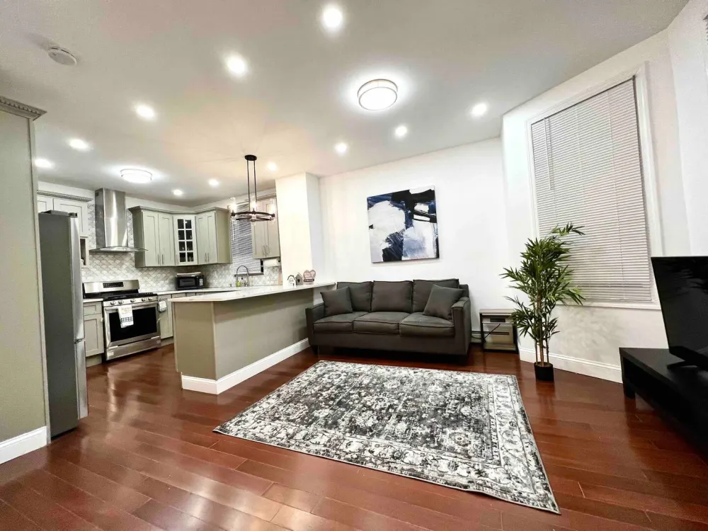 Modern open-concept kitchen and living room.