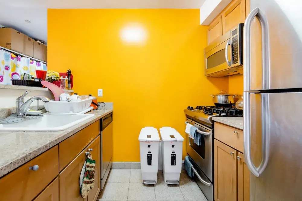 Cozy kitchen with bright walls.