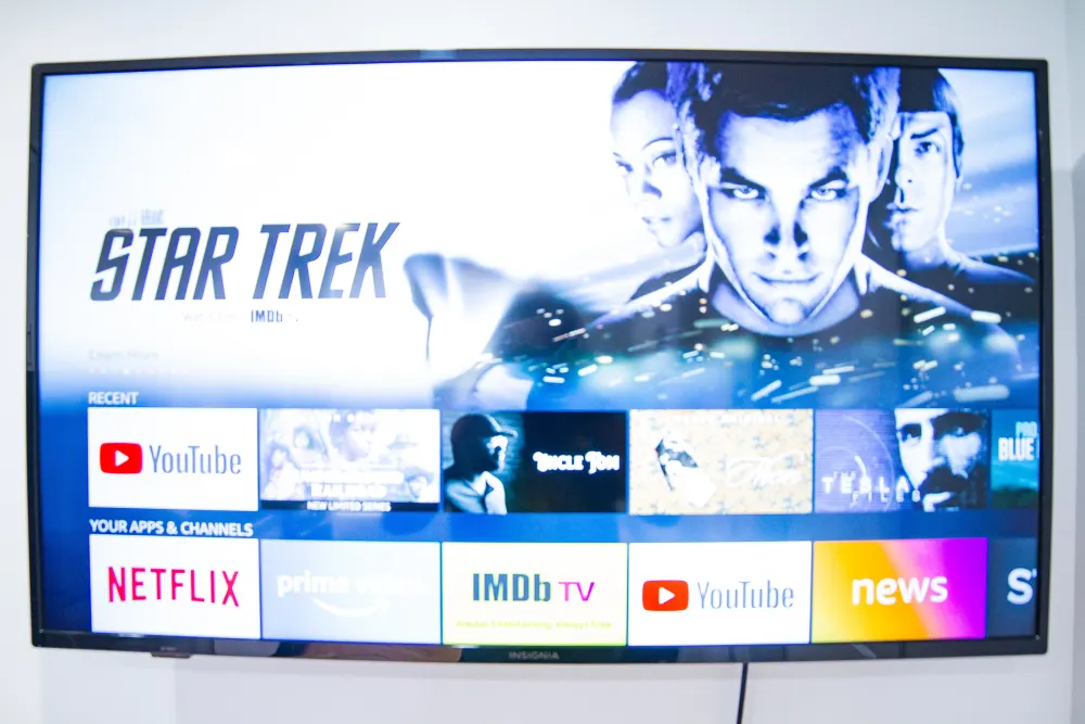 Smart TV displaying streaming service apps.