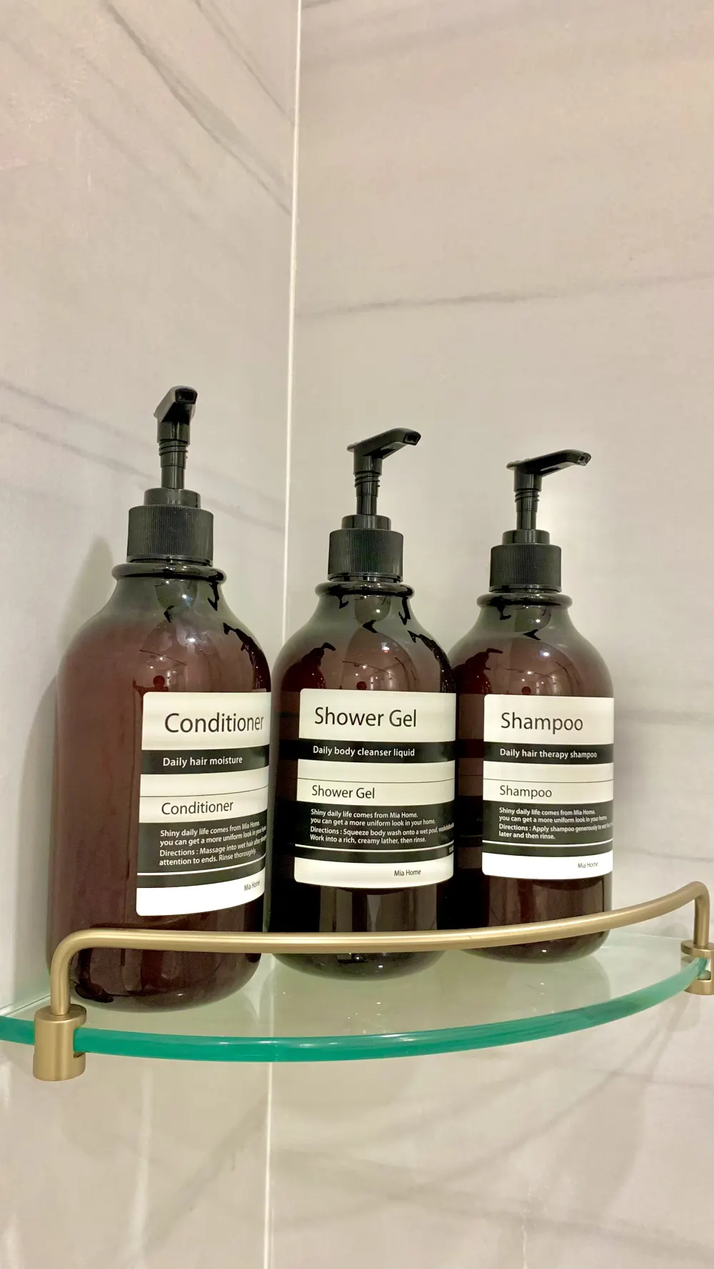 Shampoo, conditioner, and shower gel.