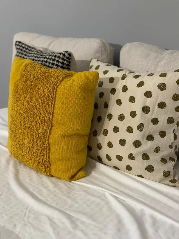 Cozy yellow and polka-dot pillows