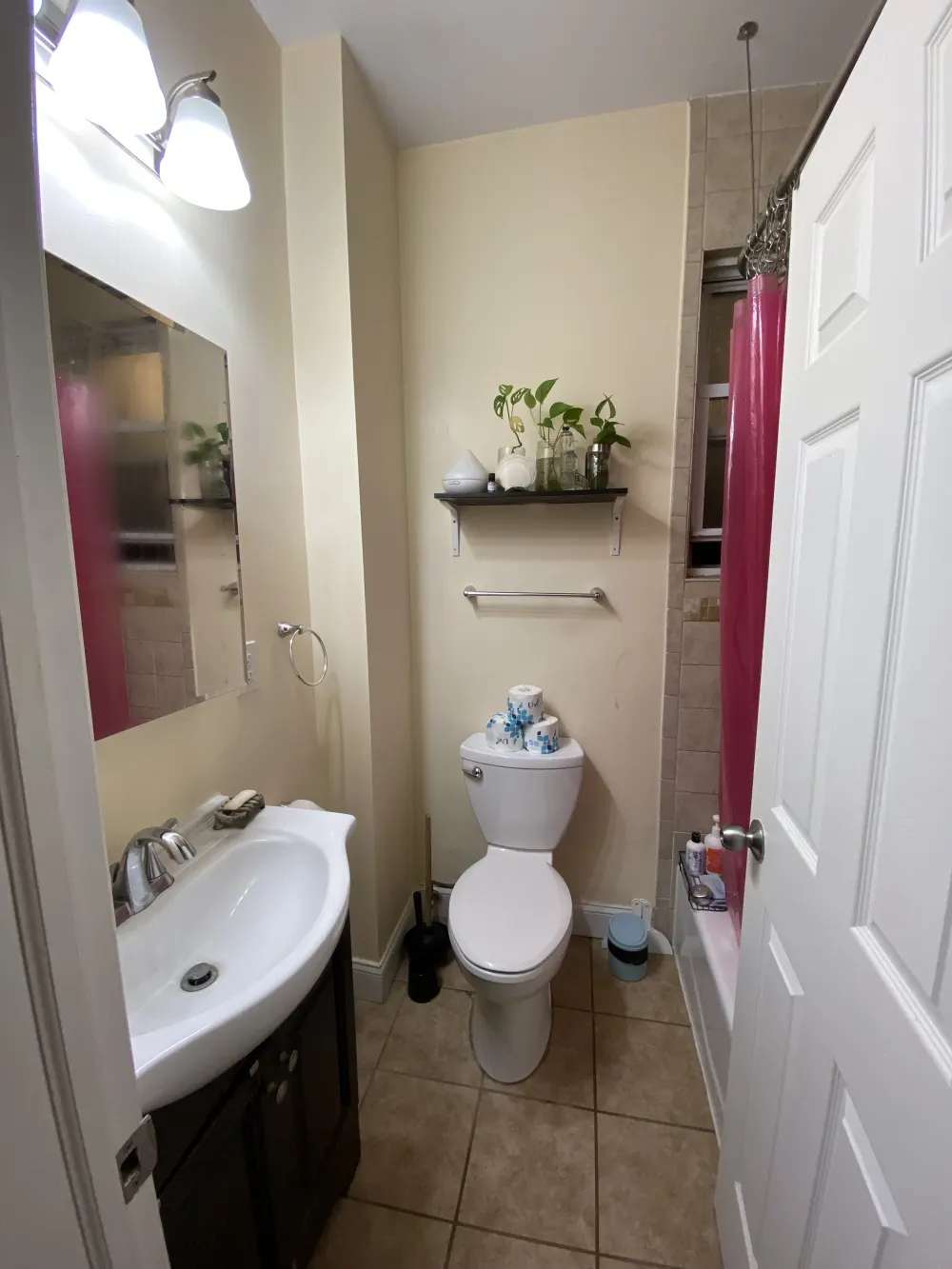 Compact bathroom with modern fixtures.