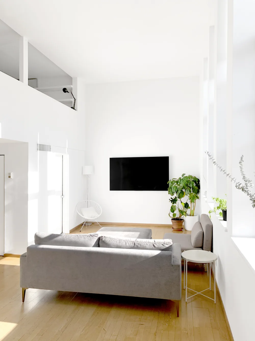 Bright minimalist living room interior.