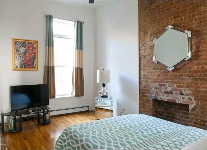 Cozy bedroom with modern decor.