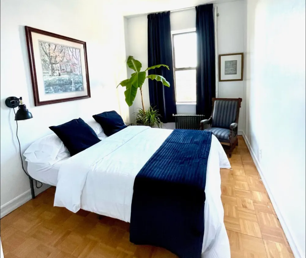 Bright bedroom with navy accents