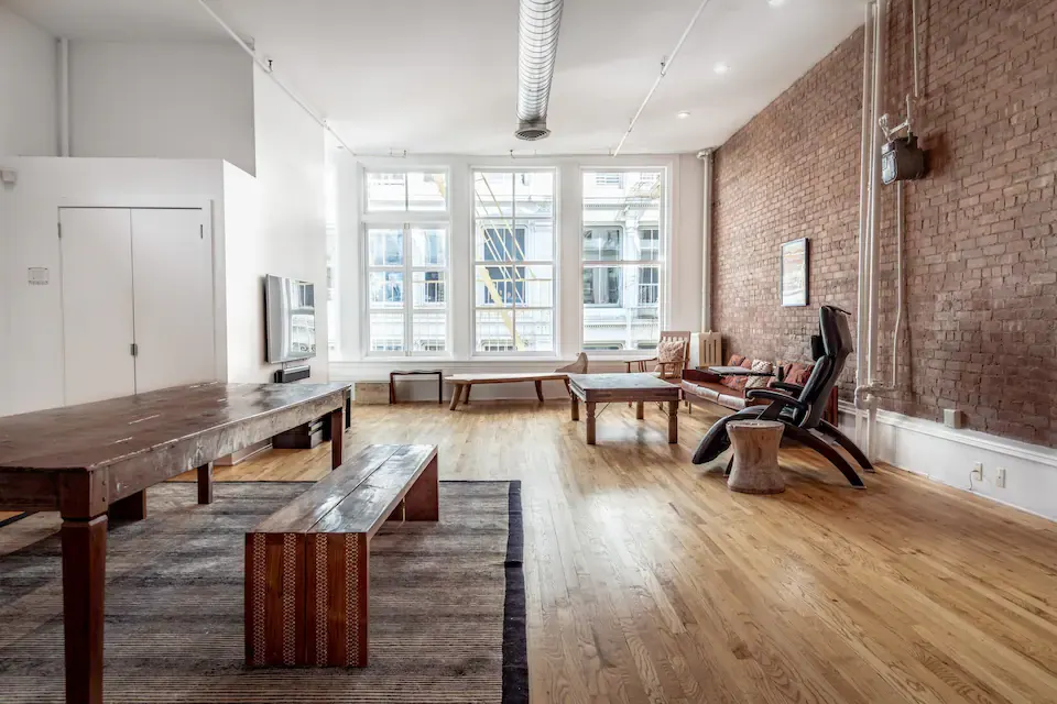 Spacious loft with exposed brick.