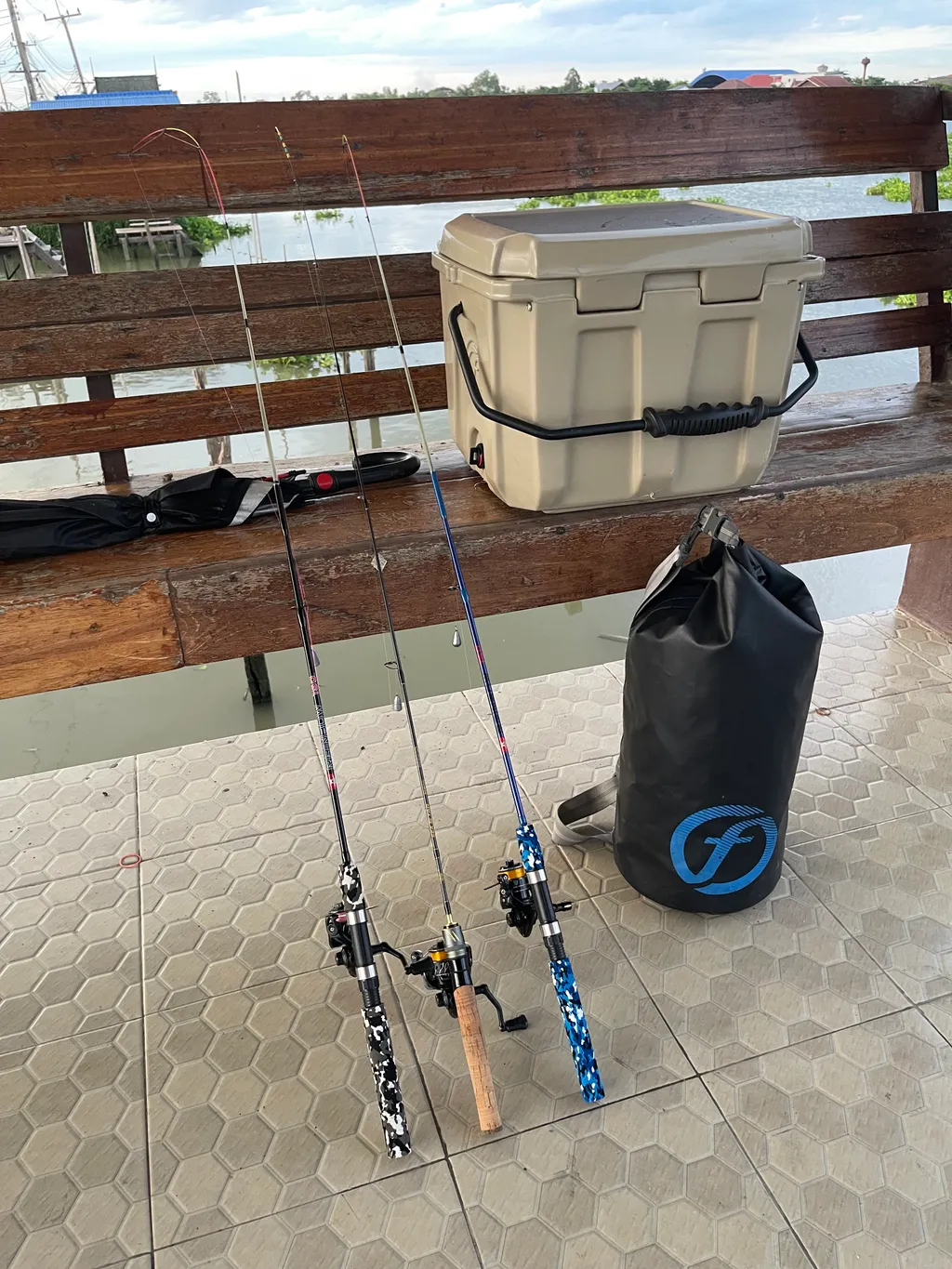 Ultra-light shrimp fishing rod setup with monofilament line used on the Chao Phraya River.