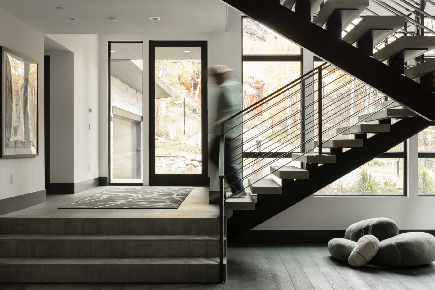 Floating metal staircase with precast concrete treads