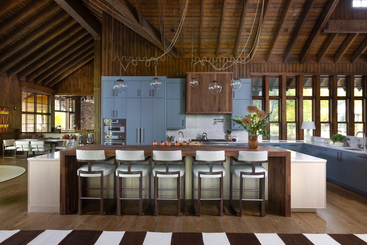 Beaver Creek Horizon — blue cabinetry modernizing a timber kitchen