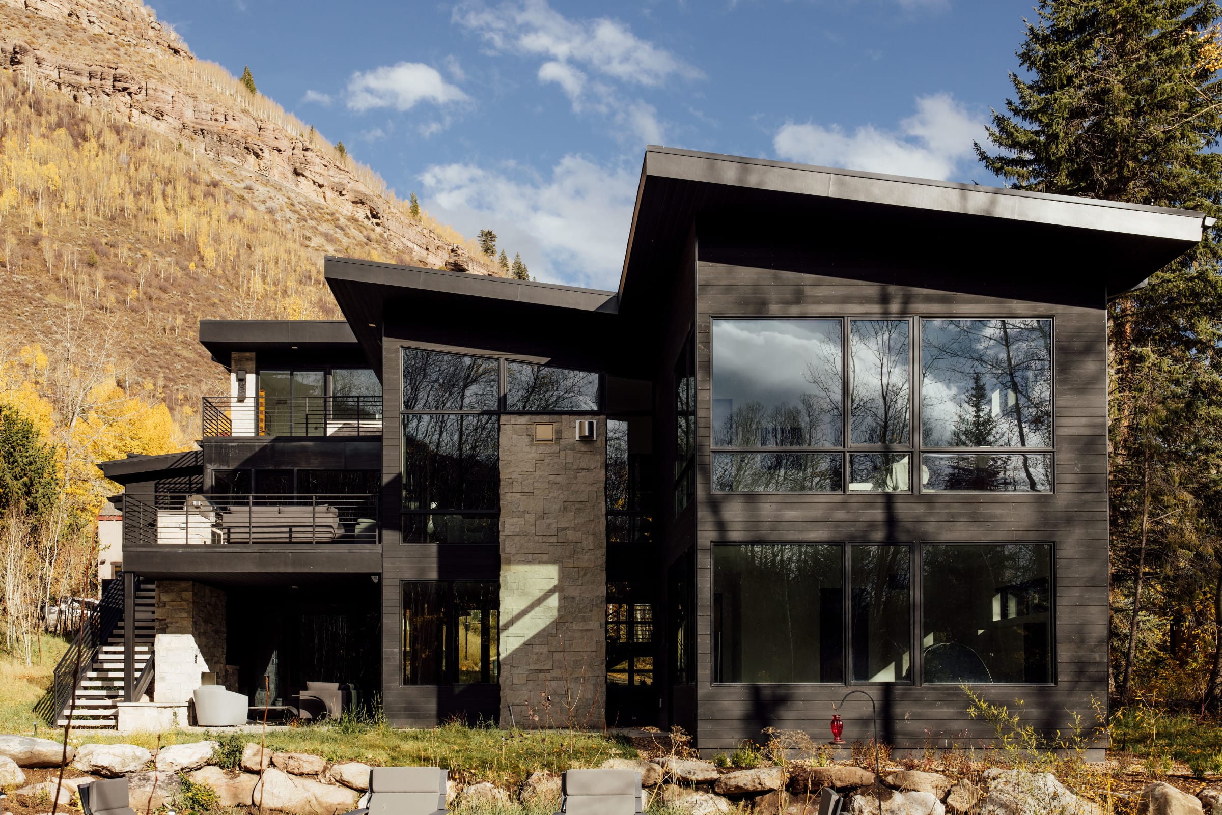 Booth Falls Residence — rear exterior at dusk