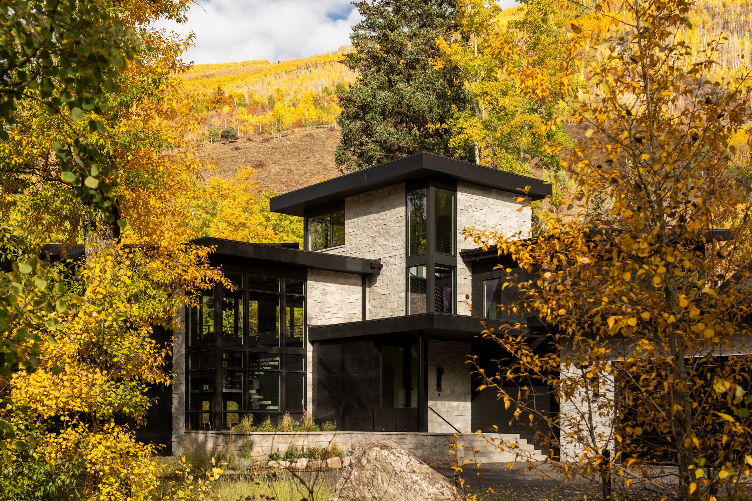 Booth Falls exterior wrapped in autumn aspen