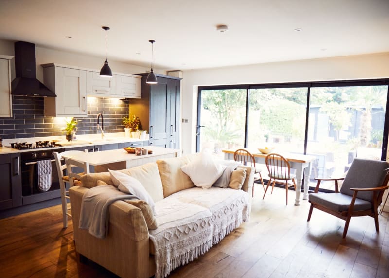 wide_angle_kitchen_dining_area_featuring_bay_door_windows_location_house_management_uk