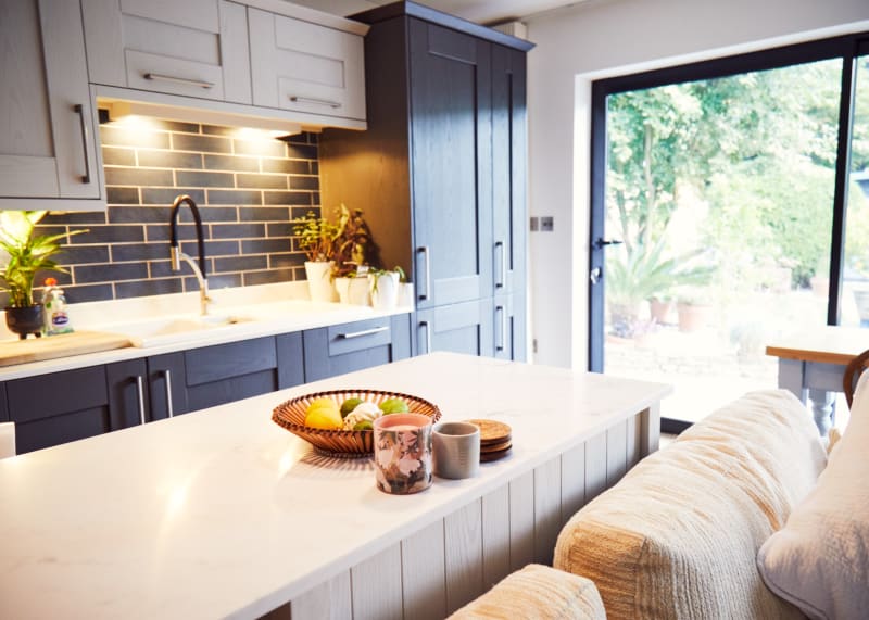 open_contrasting_modern_kitchen_bay_window_doors_house_location_photoshoots_film_tv_locations_for_hire_uk