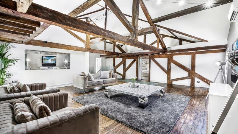 warehouse_loft_with_wooden_beams_interview_set_london_venue_hire