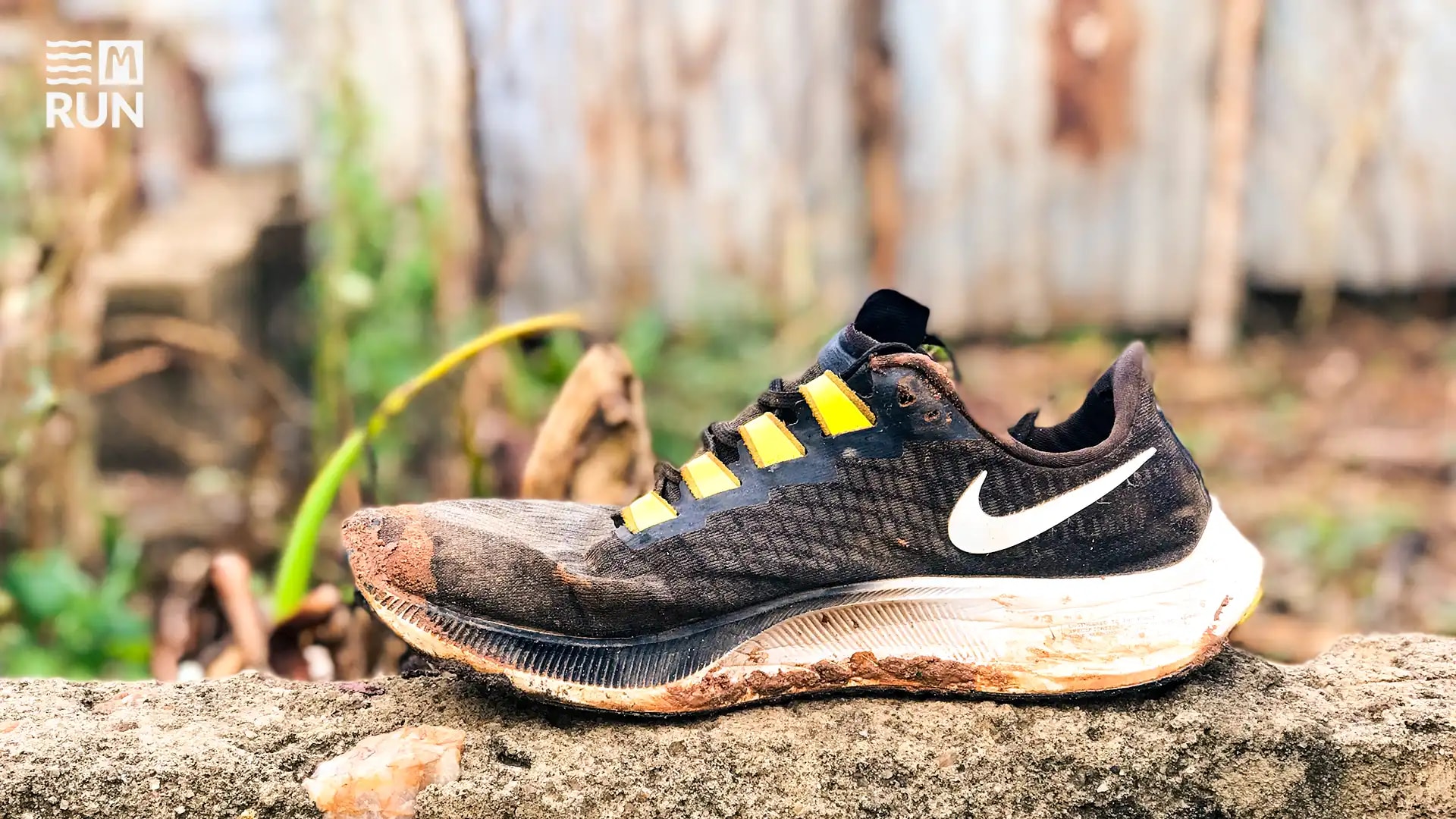 mojaka_m run_nike_pegasus Nike Pegasus running shoe covered in mud after being on the road to inspire a community