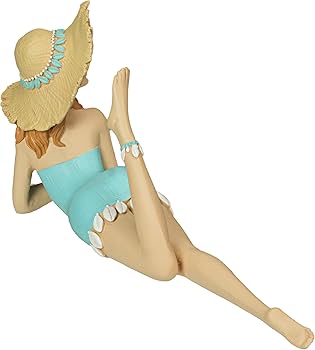 Vintage Flair with Polka Dot Swimsuit and Straw Hat