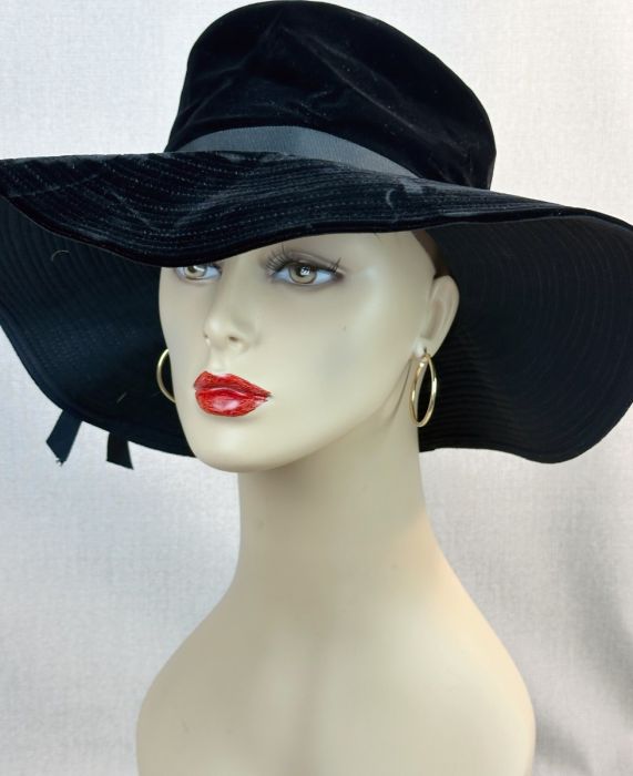 Layered Necklaces and Wide-Brim Hat with Printed Jumpsuit