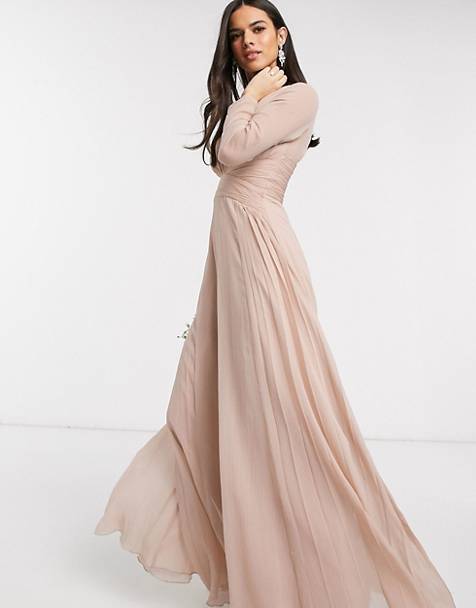 Soft Blush Ensemble with Flowing Silk Skirts