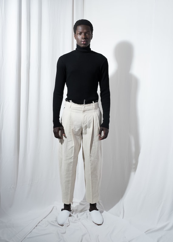Minimalist Chic: White Pants with Black Turtleneck